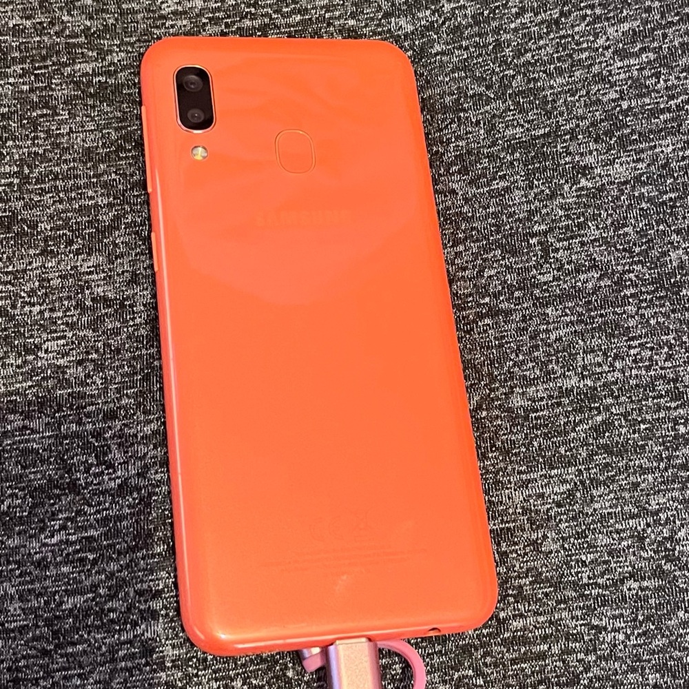 Samsung a20e Coral Pink Orange Smartphone Unlocked Used